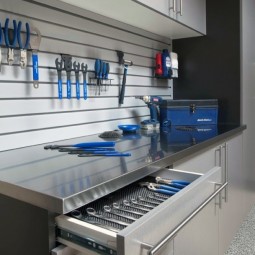 3334055 cool tool storage ideas for custom garages with slat board and pull out cabinet drawers 1467815468 650 f46add8099 1468143377.jpg