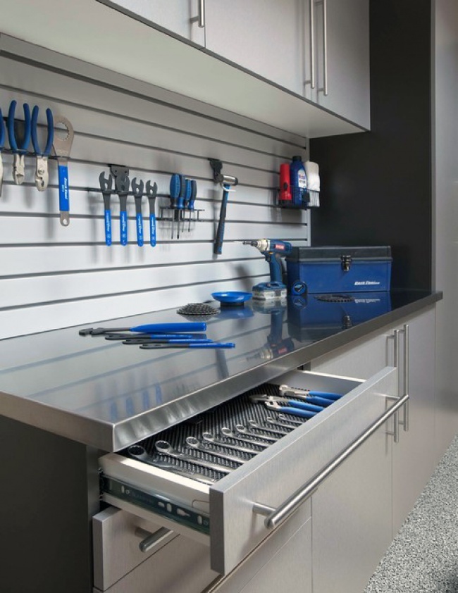 3334055 cool tool storage ideas for custom garages with slat board and pull out cabinet drawers 1467815468 650 f46add8099 1468143377.jpg