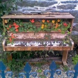 Old piano recycled planter.jpg