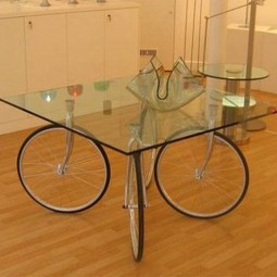 Bike wheels glass top table.jpg