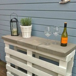 Make a bar out of pallets and landscape pavers.jpg