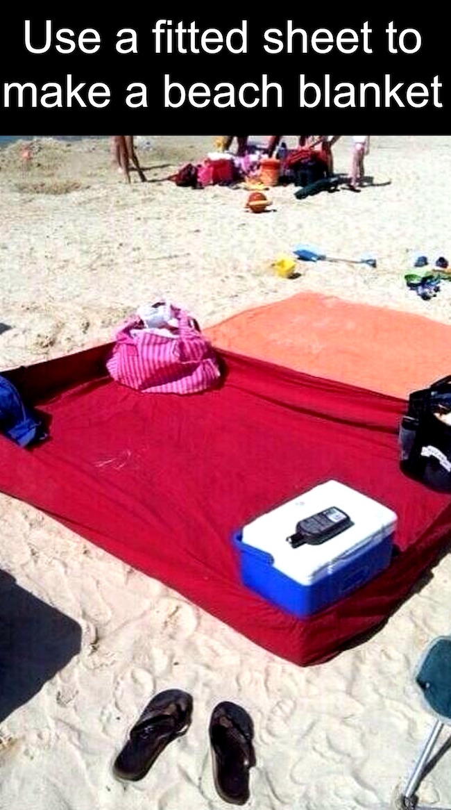 Use a fitted sheet to make a beach blanket great summer hack.jpg