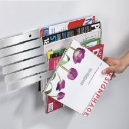 Illuzine wall mount magazine rack with its ingenious anti clutter design the illuzine magazine rack from umbra is a clever storage solution for stacks of magazines catalogs or newspapers around the ho.jpg
