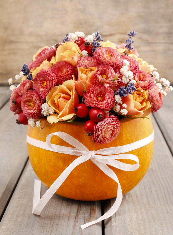 Bouquet of flowers in pumpkin