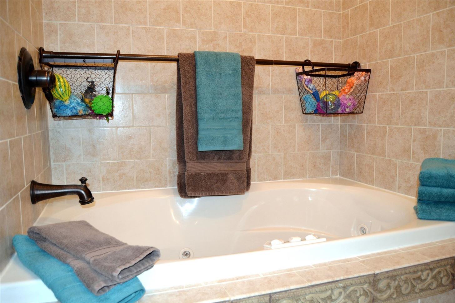 Use extra shower curtain rods increase bathroom storage more.w1456.jpg