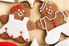 Christmas decorated gingerbread shape man woman table 47528901.jpg
