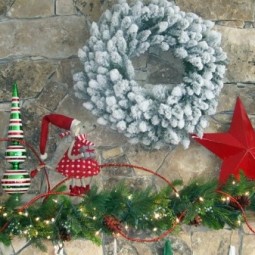 Naturstein kamin eingebaut dekorieren winter advent weihnachten figuren tanne kranz.jpeg