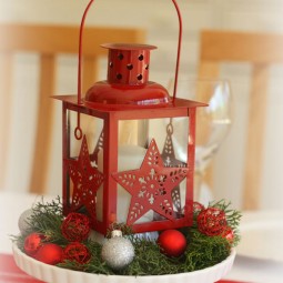 Pine tree sprig decorating ideas red lantern table piece.jpg
