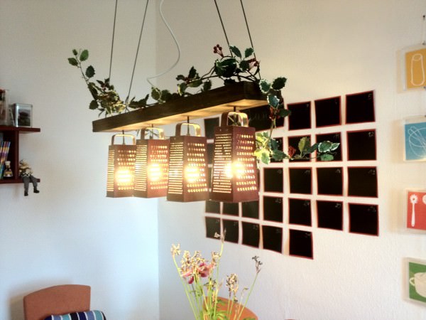 Suspended lamp made out of recycled graters.jpg
