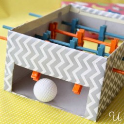 Upcycle a shoebox into a homemade foosball game.jpg