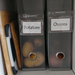 Use magazine holders to keep your onions and potatoes.jpg