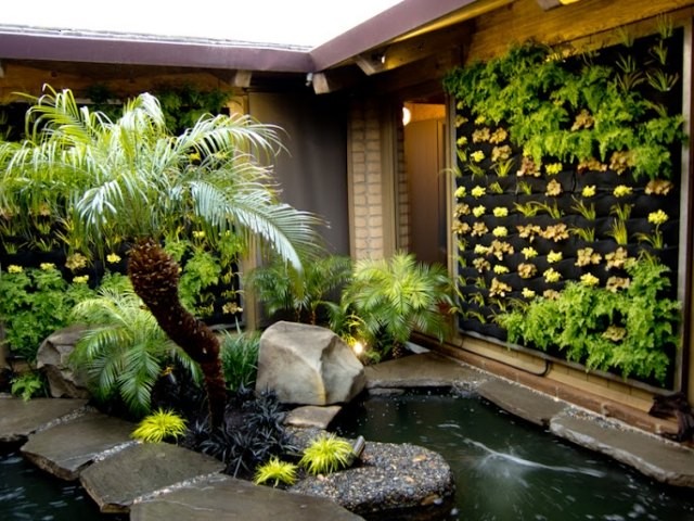 Vertikale gruenwand topfpflanzen in harmonie mit dem interieur moebel stil farben buero.jpeg