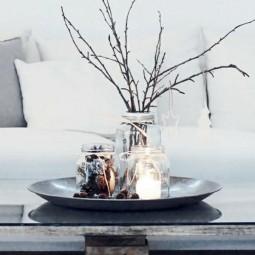 Marmeladenglaeser teelichter vase baumzweige nuesse arrangement tisch wohnzimmer.jpg