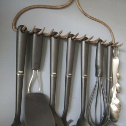 Repurposed rake head as utensil holder.jpg