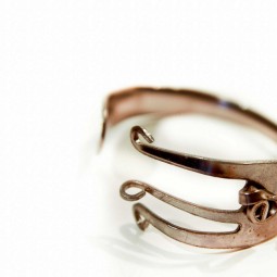 Bend an old fork into a stylish cuff bracelet.jpg