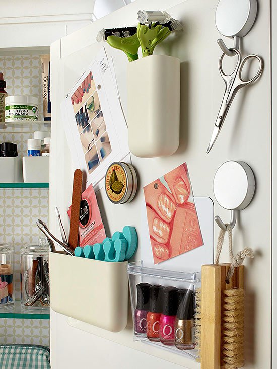Diy bathroom organization ideas mount a magnetic memo board inside a cabinet door to add more storage with magnetic containers via bhg.jpg
