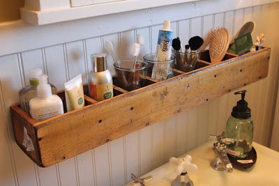 Diy bathroom organizer ideas turn a divided box or cd tower on its side and mount it on the wall as the greatest space saving organizer for your bathroom via itsy bits and.jpg