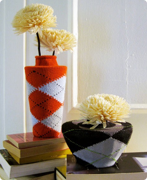 Dress up your flower pots with colorful socks to brighten up your space.jpg