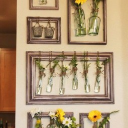 Fill your blank walls with fresh flowers by hanging jars inside old picture frames.jpg