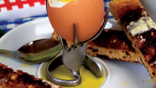 Repurpose an old fork as an awesome egg cup.jpg