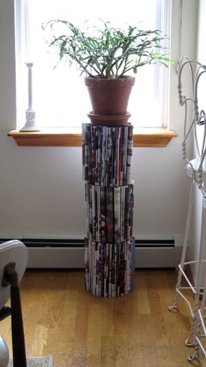 Repurpose some old magazines into a plant stand.jpg