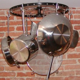 Turn a bicycle wheel into a hanging pot rack.jpg