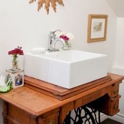Update an old singer sewing machine into the perfect sink vanity.jpg