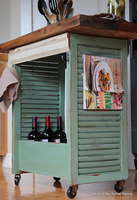 Kitchen island made from shutters and repurposed wood.jpg