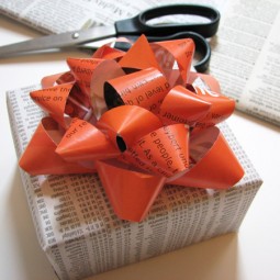 Make gift bows from a magazine page for birthday or holiday presents.jpg