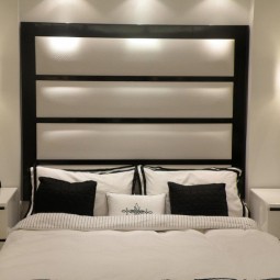 Tete de lit rembourree cadre noir tapisserie blanche.jpg