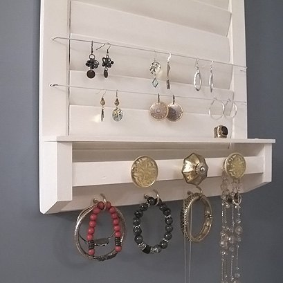 Turn a discarded shutter into the perfect spot to store your jewelry.jpg
