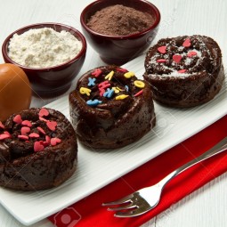 10786004 delicious decorated chocolate muffins stock photo.jpg