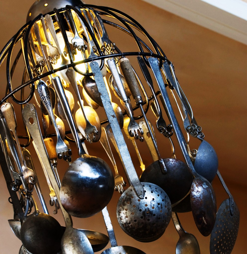 Create a unique kitchen chandelier with an assortment of ladles sieves and spoons.jpg