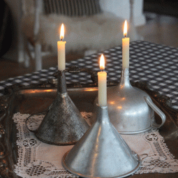 Funnels turned candle holders.gif