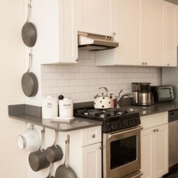 Gallery 1493068414 ghk kitchen purge pots and pans wall.jpg