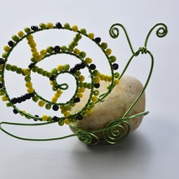 Cute aluminum wire wrapped snail with colorful seed beads.jpg