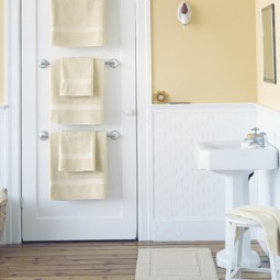 Install multiple towel rods on the back of your door.jpg