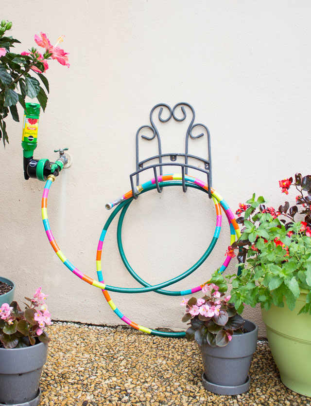With just a little colored duct tape transform your ordinary garden hose into a work of art.jpg