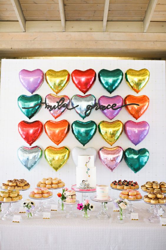 05 colorful heart balloons as a backdrop for the dessert table.jpg