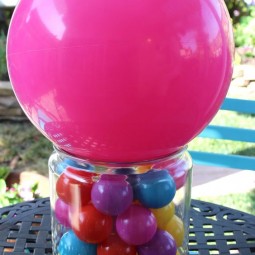 10 a colorful ball centerpiece in a jar and a pink balloon on top.jpg