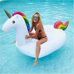 12 funny unicorn pool float with a horn and colorful details.jpg