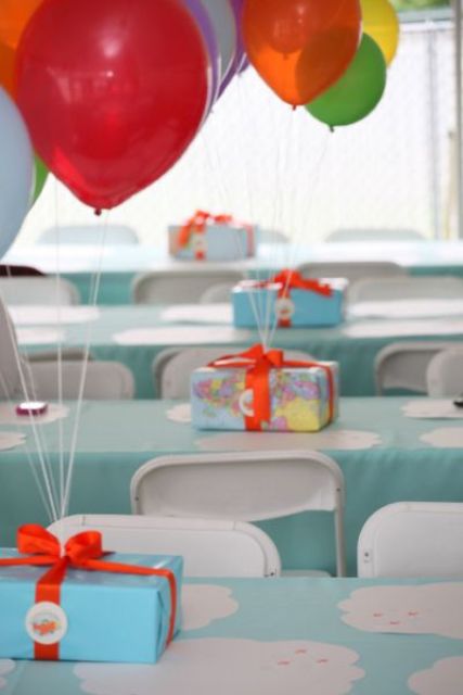14 boxes with balloons attached create a centerpiece which doesnt take much space.jpg