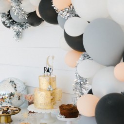 14 cool modern balloon arch over the dessert table.jpg