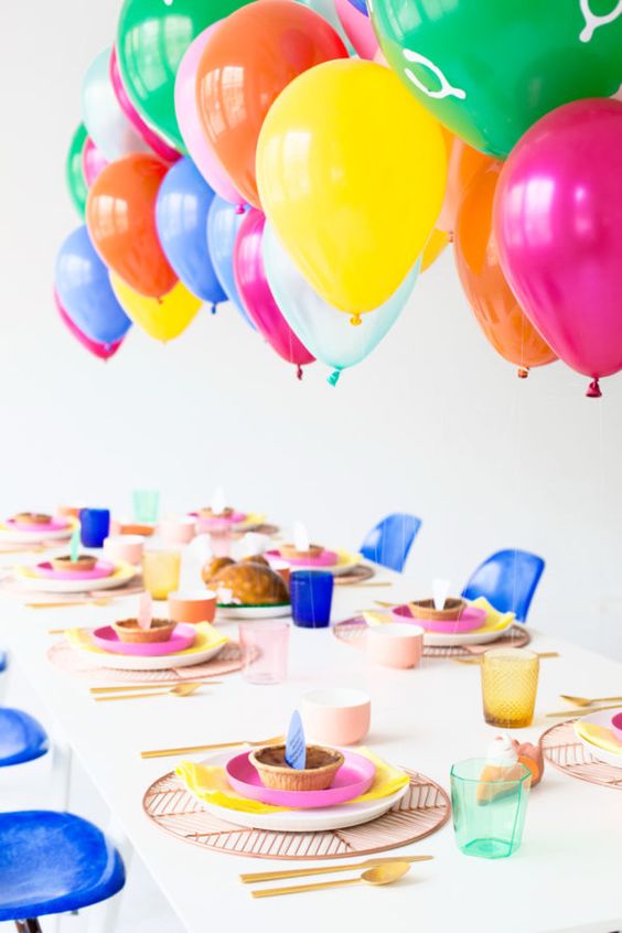 20 colorful balloons over the reception table will excite the kids.jpg