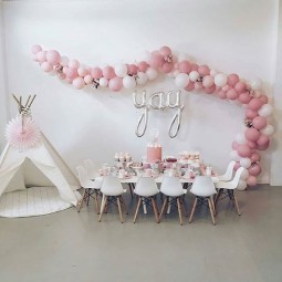 21 white and pink balloon garland over the reception.jpg