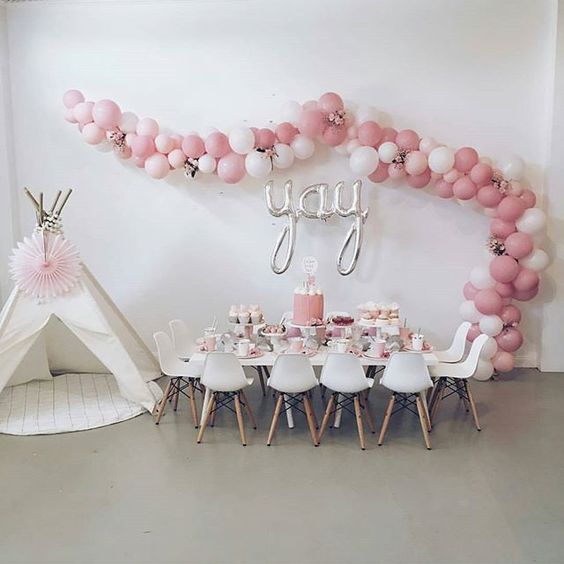 21 white and pink balloon garland over the reception.jpg