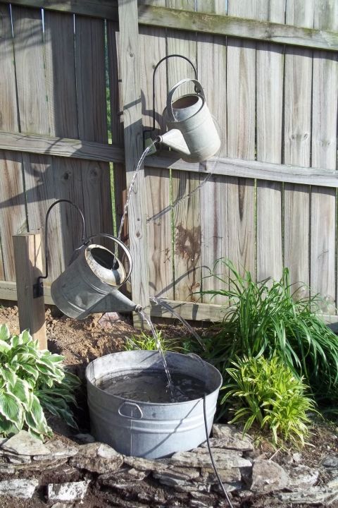 Gallery 1490296632 watering can water feature.jpg