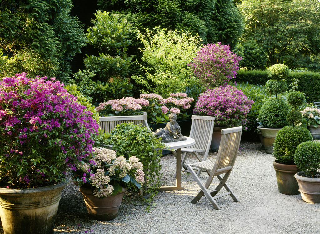 Garten kuebelpflanzen romantisch sitzplatz.jpg
