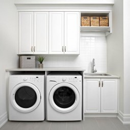 White modern laundry room clothes rod gray staggered floor tiles.jpg