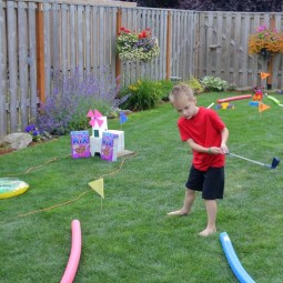 Kinderspiele garten mini golf gestalten draussen spielen zaun blumen.jpg
